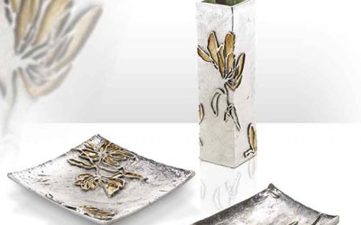 Centritavola e vaso Valori Group argenteria collezione "Golden Wall" - In resina d'argento e doratura.